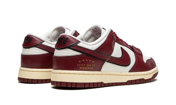 NIKE DUNK LOW WMNS "Just Do it - Team Red" - Image 2